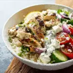 Mediterranean Chicken Rice Bowl with Tzatziki and Feta