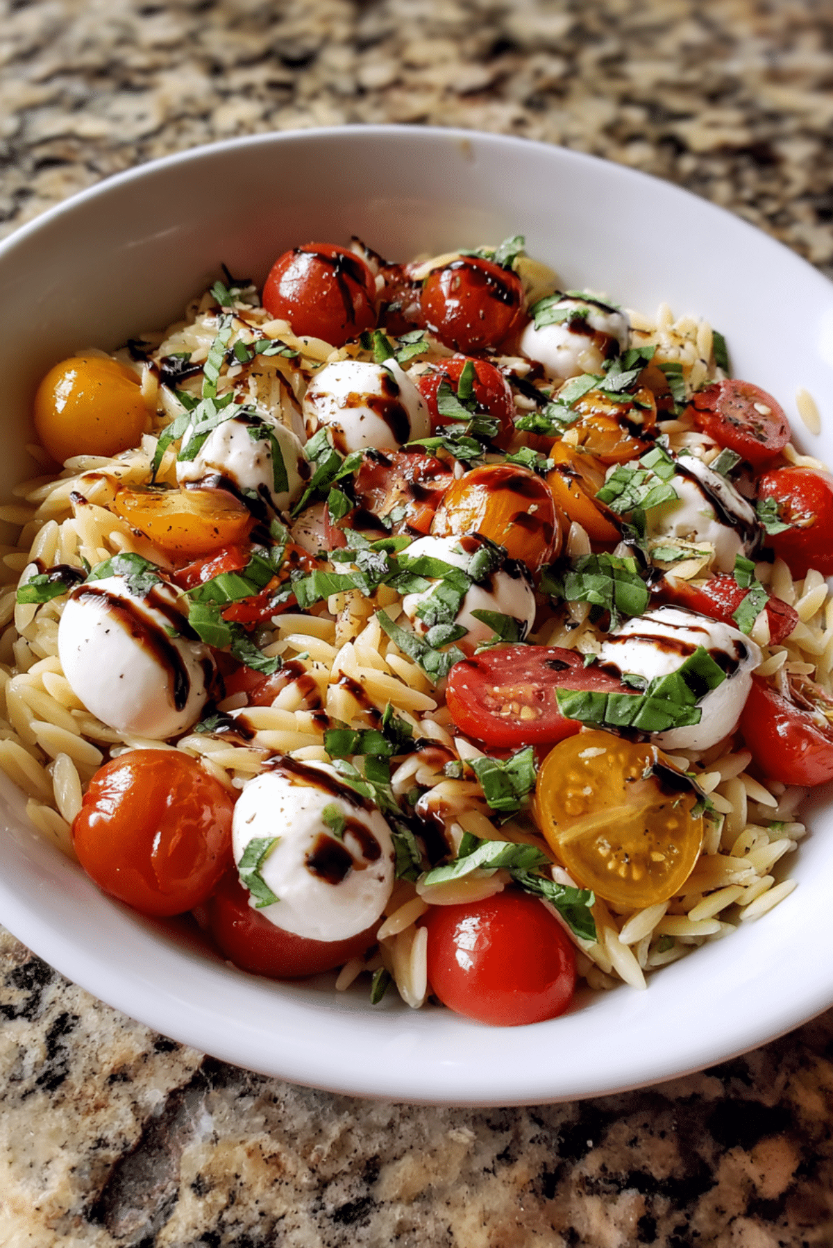 Orzo Salad with Pearl Mozzarella, Pesto, and Cherry Tomatoes