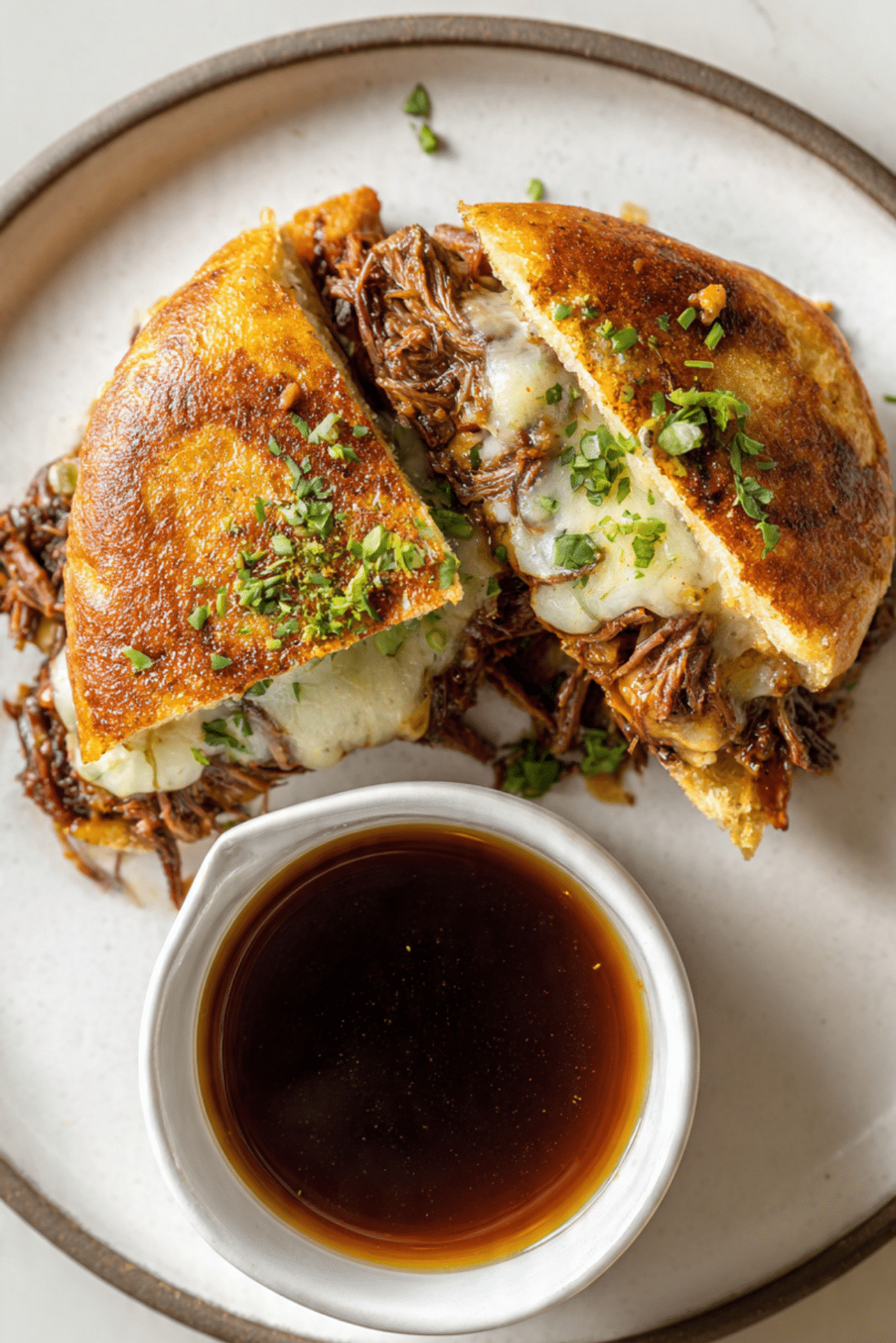 Birria Beef Sandwich with Consommé